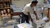 Indonesia's Widodo calls for unity as divided Jakarta goes to the polls