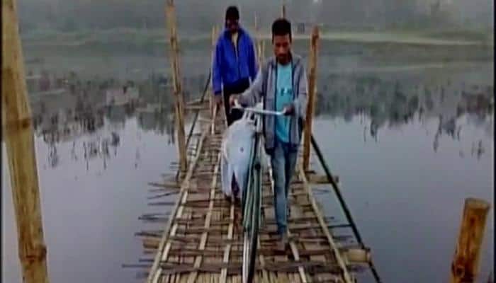 In Assam, youth carries kin&#039;s body on cycle; CM Sarbananda Sonowal orders probe
