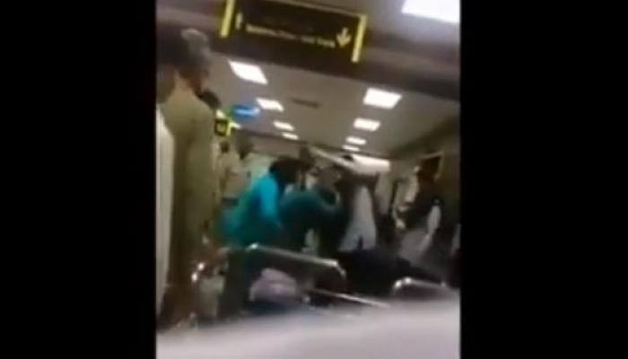 Shocking! Pak cop brutally thrashes woman, daughter at airport; gets suspended: WATCH