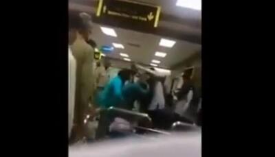 Shocking! Pak cop brutally thrashes woman, daughter at airport; gets suspended: WATCH