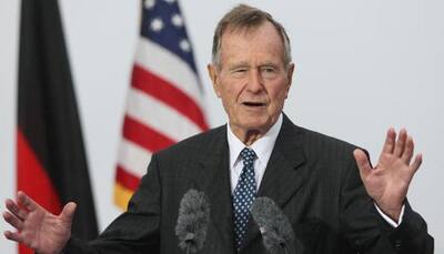George H W Bush still in hospital; George W Bush visits