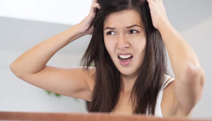 Persistent dandruff - Could it be a sign of these health conditions? Steps to prevent it