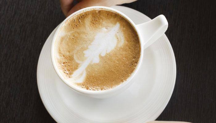 Gulping more than three cups of coffee a day can halve prostate cancer risk