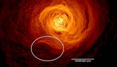 Giant wave of hot gas discovered in nearby Perseus galaxy cluster