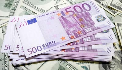 Global stocks, euro dip as Macron win shifts focus to economy