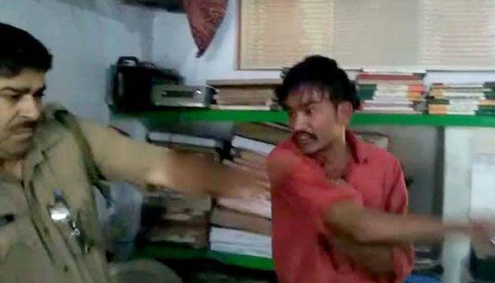 Out of power in UP but 'gundagardi' continues; Samajwadi Party MLC's nephew slaps police officer on camera