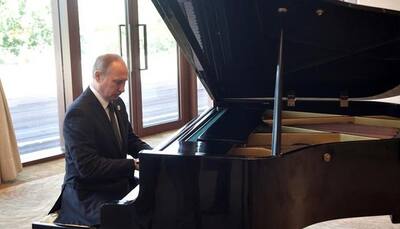 When Vladimir Putin played piano while awaiting Xi Jinping in Beijing - Watch