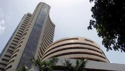 Sensex gets off record high, dives 222 points