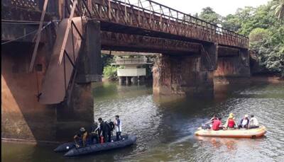 Onlookers watching a man trying to commit suicide fall into river as bridge collapses in Goa; 2 dead