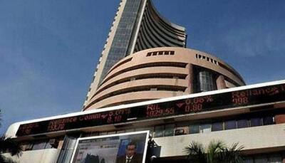 Sensex, Nifty rise as FMCG stocks rally