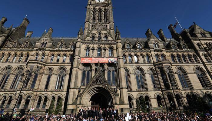 British police name suicide bomber, threat level raised to critical