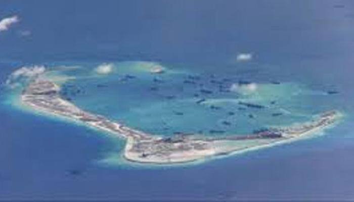 US Navy ship sails near South China Sea reef claimed by Beijing: US official