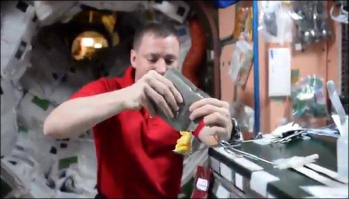 Overcoming space challenges: Astronaut Jack Fischer attempts to eat a 'floating' pudding on the ISS! - Watch video
