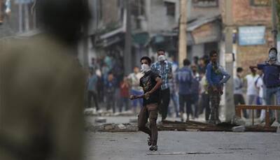 Protesters clash with security forces in Kashmir