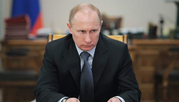 Vladimir Putin praises Donald Trump, says US spies may have faked hacking evidence