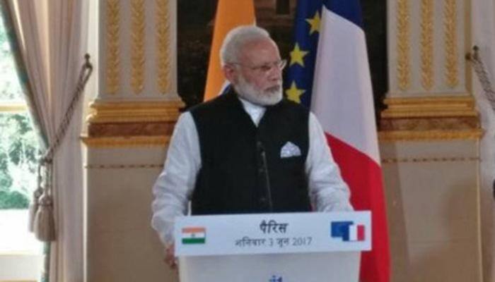 Climate change, terrorism biggest threats to humanity: PM Modi at Elysee Palace in Paris