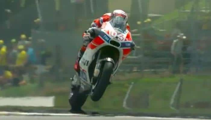 Andrea Dovizioso overcomes food poisoning to win Italian MotoGP