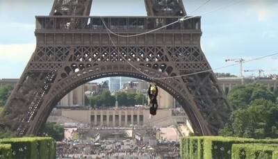 Are you daredevil enough to zip-line off the iconic Eiffel Tower? WATCH breathtaking video
