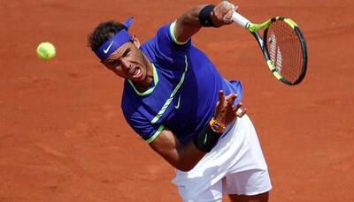 French Open 2017: Rafael Nadal walks into 10th semi-final after Pablo Carreno Busta retires with injury