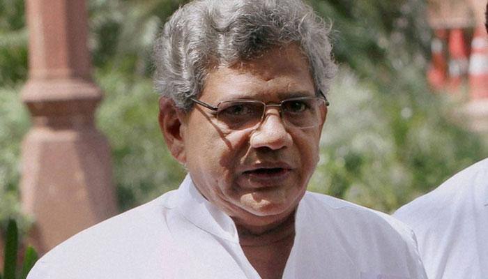 Sitaram Yechury roughed up by two Hindu Sena activists at press meet