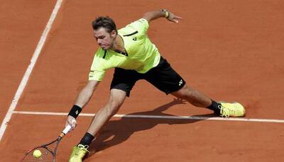 French Open: Andy Murray beats Kei Nishikori to set up date with Stan Wawrinka in semi-finals