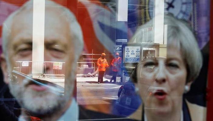 Polls open in Britain`s general election; Theresa May's bid for stronger Brexit hand at stake