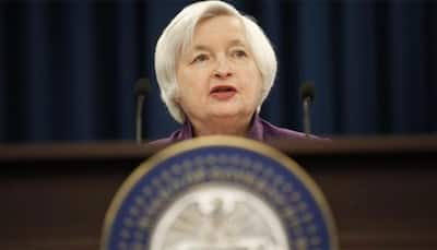 US Fed raises rates, unveils balance sheet cuts in sign of confidence