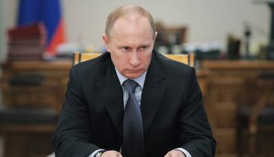Vladimir Putin jokes could offer asylum to ex-FBI chief James Comey