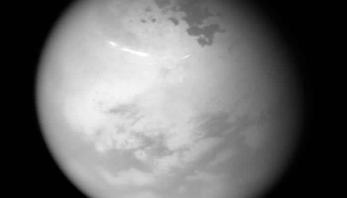 NASA&#039;s Cassini spots bright methane clouds, hydrocarbon seas on Saturn&#039;s moon Titan