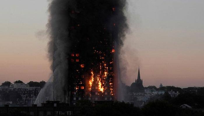 Railway track near London tower blaze closed at fire brigade&#039;s request