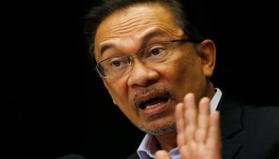 Jailed Malaysian opposition leader Anwar Ibrahim withdraws as PM candidate