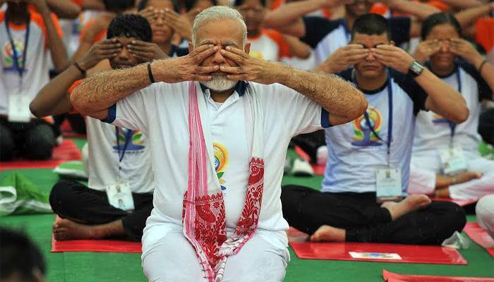 International Yoga Day: PM Narendra Modi performs asanas, says yoga has played &#039;big role&#039; in uniting the world