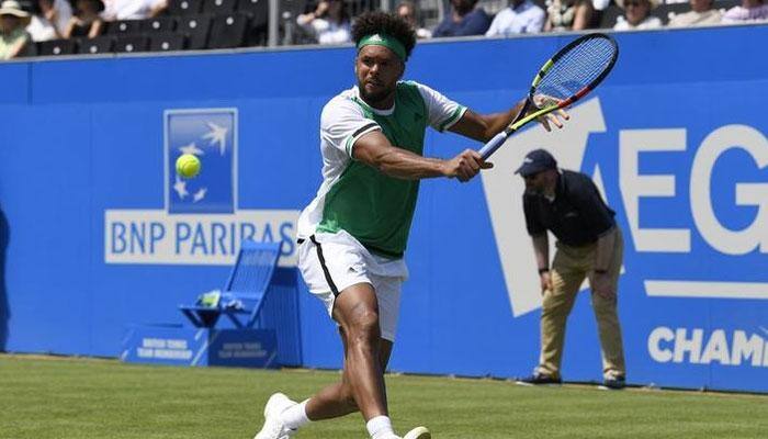 Jo-Wilfried Tsonga becomes latest star to be knocked out at Queen&#039;s, Grigor Dimitrov survives scare
