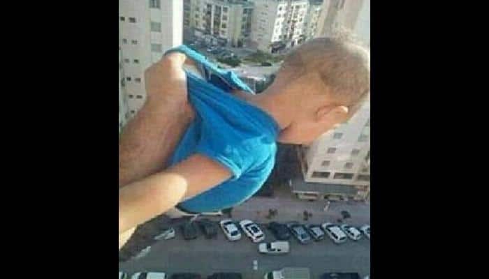 Algerian man dangles infant out of 15-storey window for 1,000 Facebook &#039;likes`