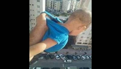 Algerian man dangles infant out of 15-storey window for 1,000 Facebook 'likes`