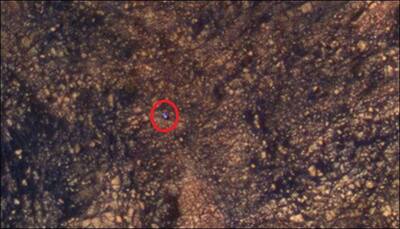Up above Mars so high: NASA's MRO captures Curiosity scaling the Martian surface! - See pic