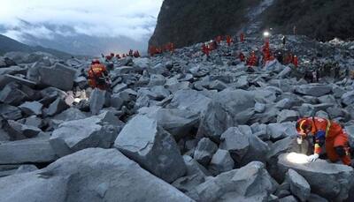 15 dead, over 100 missing in China landslide