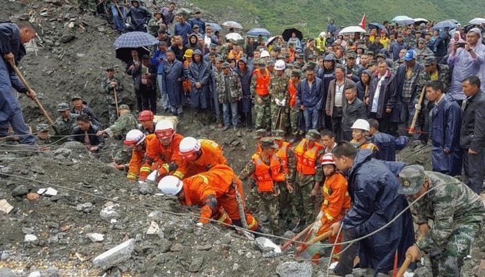 Hopes fading in China for 118 still missing day after landslide