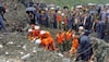 Hopes fading in China for 118 still missing day after landslide