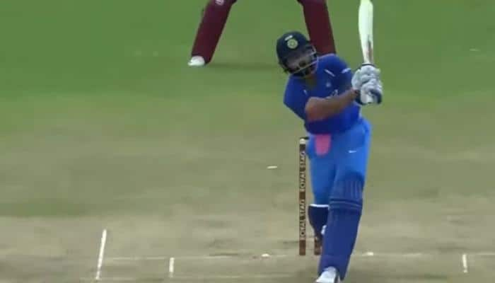 WATCH: Virat Kohli simulates MS Dhoni&#039;s &#039;Helicopter shot&#039; for a six during 2nd ODI against West Indies