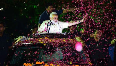 PM Narendra Modi holds roadshow in 'special city' Rajkot - See Pics