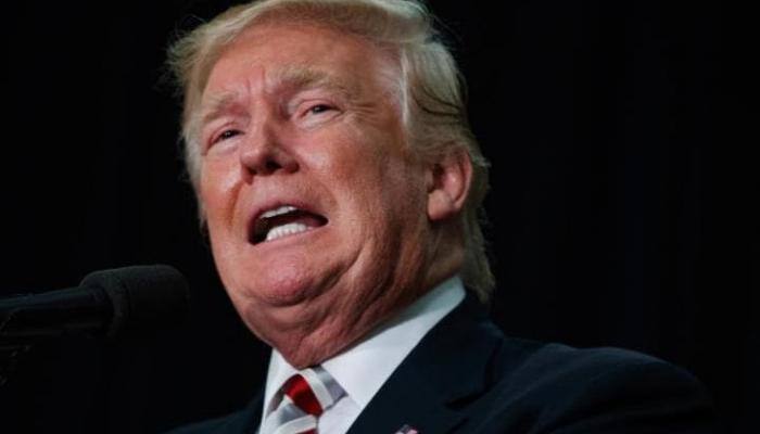 Trump administration reverses policy on fiancés as travel ban takes effect