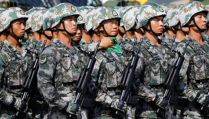 Massive military parade for Xi Jinping as Hong Kong activists freed