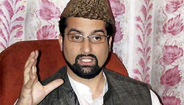 J&amp;K police halves security of separatist Mirwaiz Umar Farooq from 16 to 8 personnel