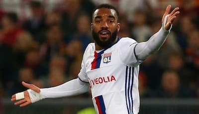 Arsenal break club record to sign France forward Alexandre Lacazette from Lyon