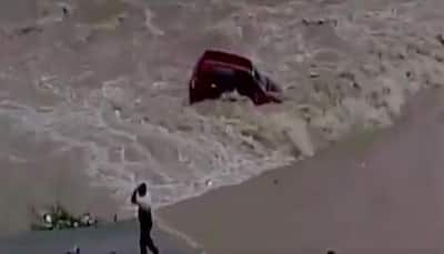 Flash-flood washes away car in Uttarakhand's mighty Gandak River - Watch Video