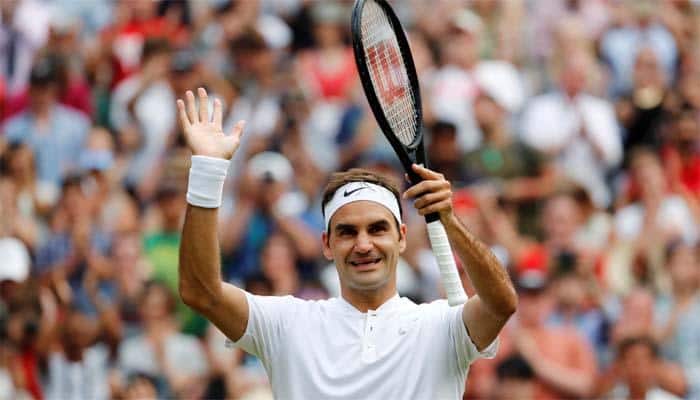 Wimbledon 2017: Roger Federer eases past Dusan Lajovic into third round