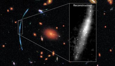 NASA's Hubble spots clumps of new stars in lensed galaxy