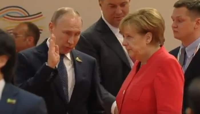 Merkel's 'epic' eye-roll while talking to Putin at G20 Summit takes internet by storm - Watch