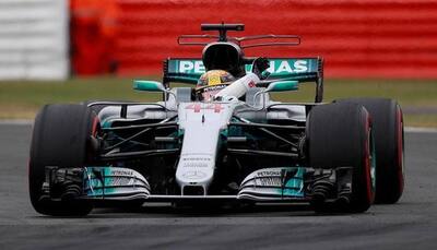 British GP: Lewis Hamilton beats Kimi Raikkonen to pole, faces investigation
